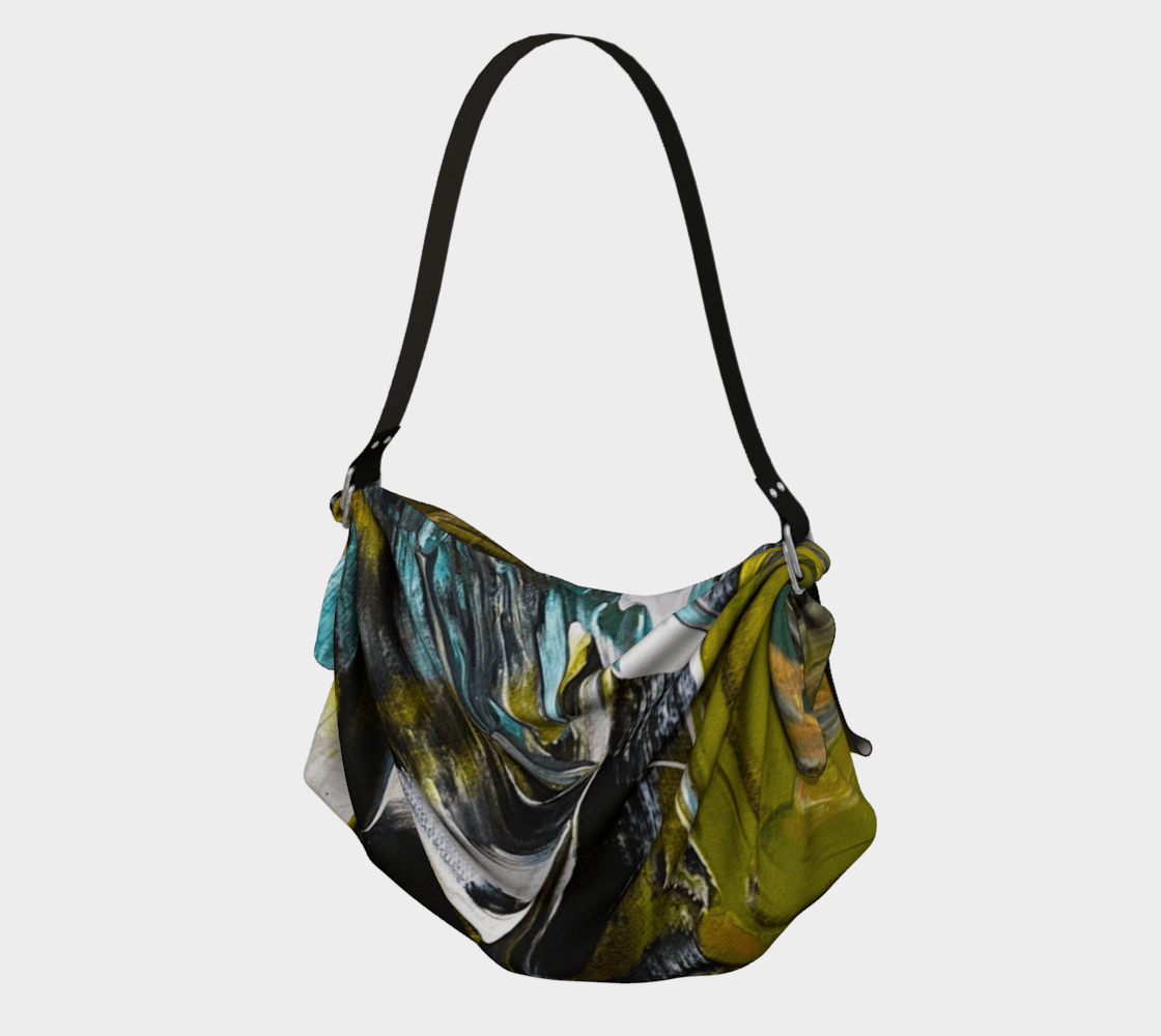 A colorful purse with a black strap on a white background