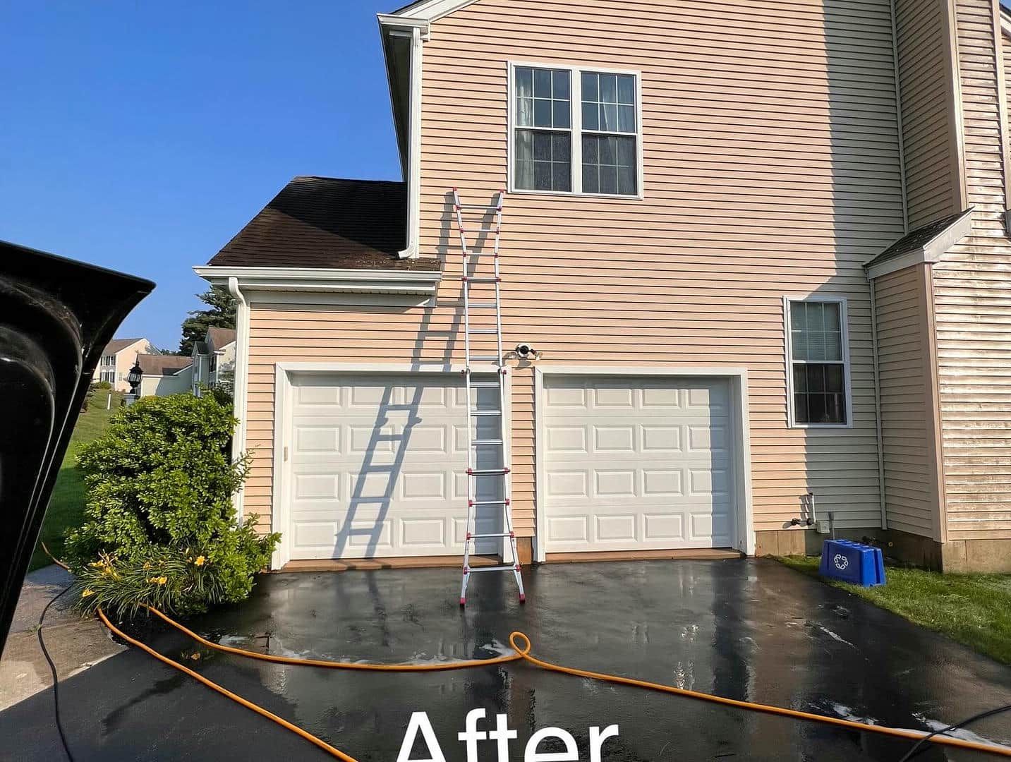 A picture of a house after being pressure washed