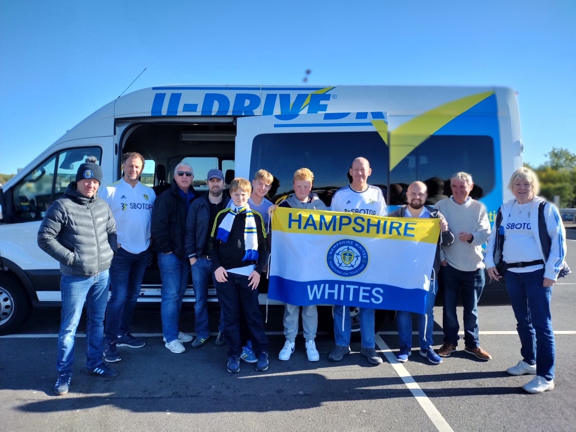 Hampshire Whites gather outside bus on route to Elland Road