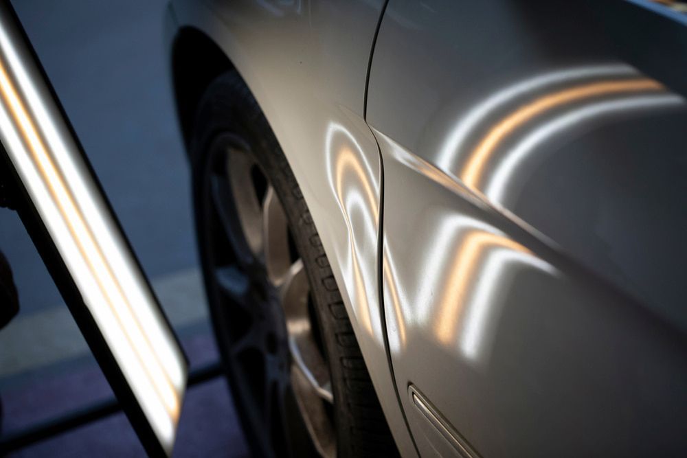A Car With a Reflection of a Light on It — Seabreeze Auto Body in Coffs Harbour, NSW