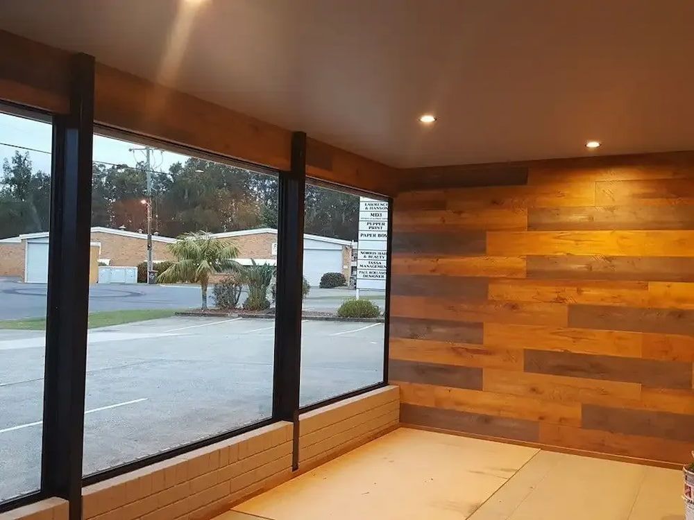 A Room With a Wooden Wall and a Lot of Windows — Seabreeze Auto Body in Coffs Harbour, NSW