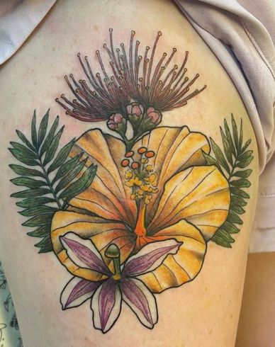 “Hibiscus flower thigh tattoo – Waikiki floral tattoo design at Aloha Tattoo.”