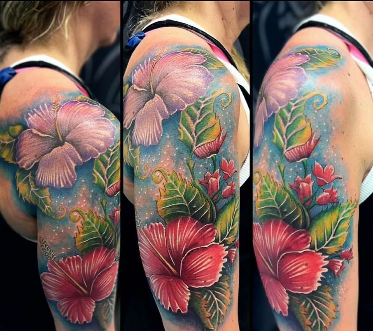 A woman has a tattoo of pink flowers and green leaves on her arm
