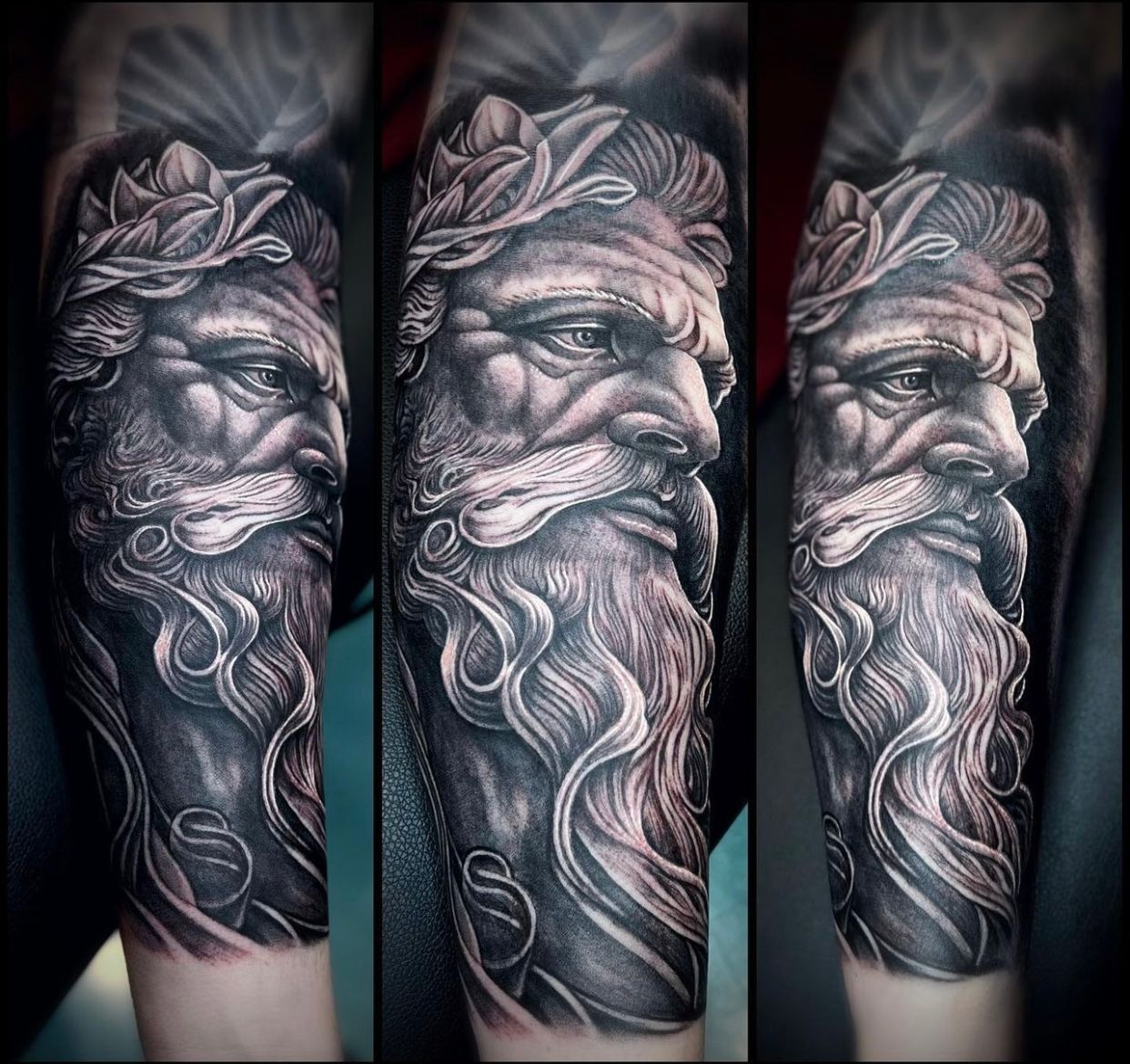 A tattoo of a man with a beard and a crown on his head.