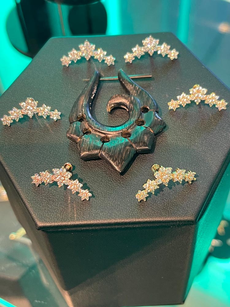 A black box filled with various types of jewelry.