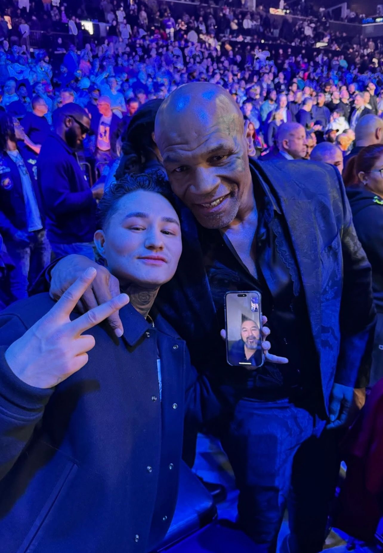 Tattoo Artists, Yudel, posing with Mike Tyson.
