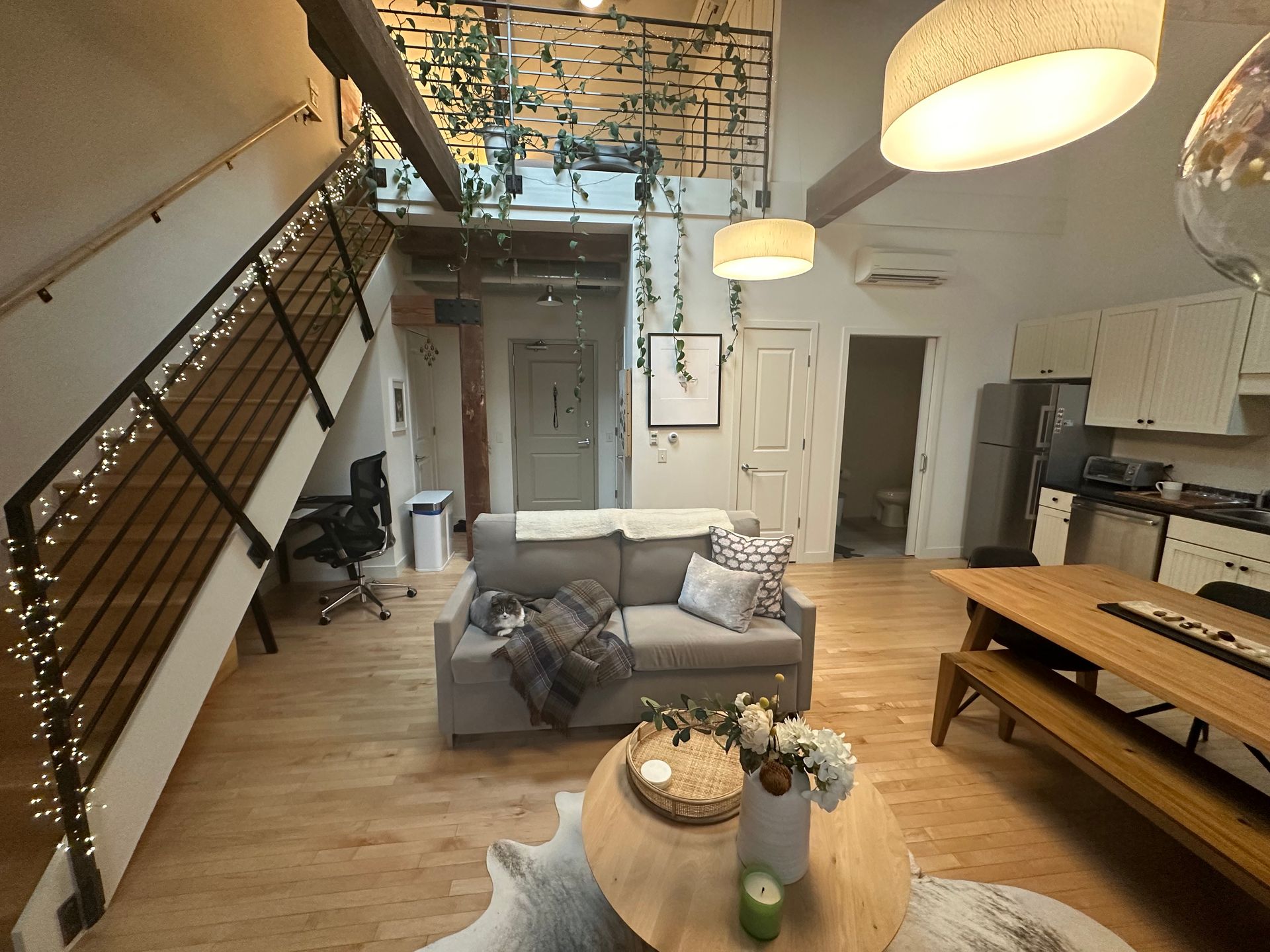 A living room with a couch and a table