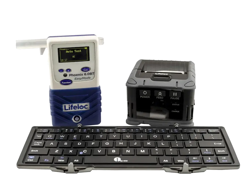 Breathalyzer, printer, and keyboard set for alcohol testing. Blue, black, and gray colors.