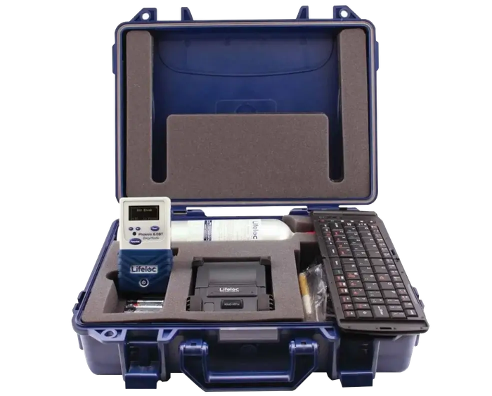 Blue case containing scientific equipment: meter, tube, keyboard.