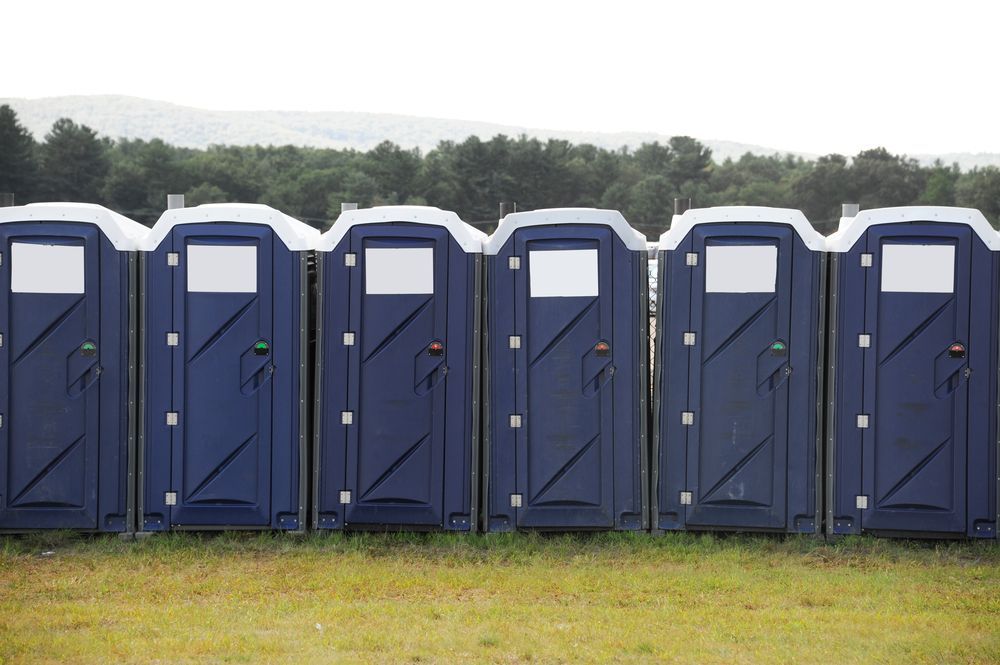 Row Of Portable Toilets — Liquid Waste Removal in Tamworth, NSW