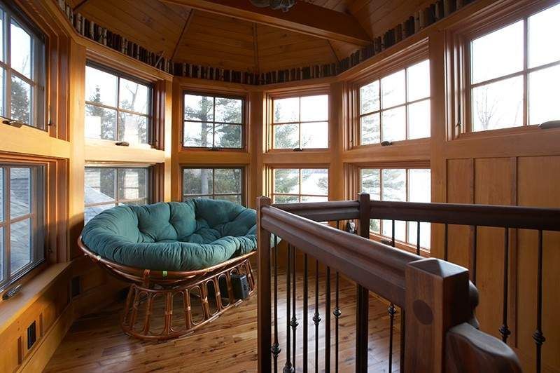 Lake house sunroom Interior Design Lisa St. Amand Designs