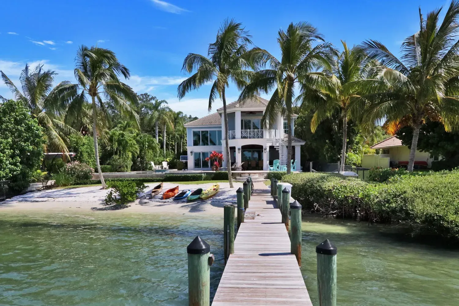 Coastal Dock and pool home  Design Lisa St. Amand Designs
