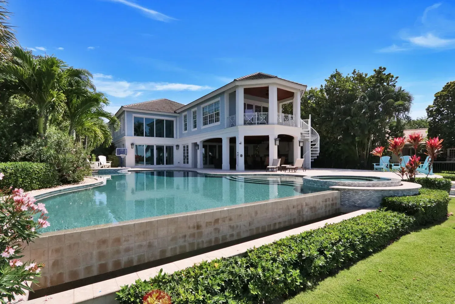 Infinity Pool and Home view Interior Design Lisa St. Amand Designs