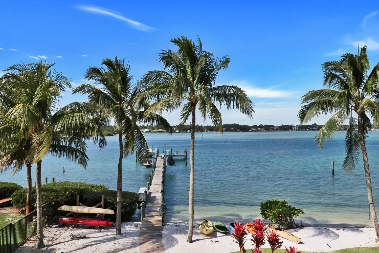 Dock view with kayaks home Design Lisa St. Amand Designs