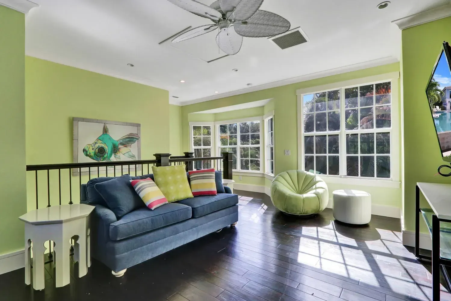 Sunroom green walls Interior Design Lisa St. Amand Designs
