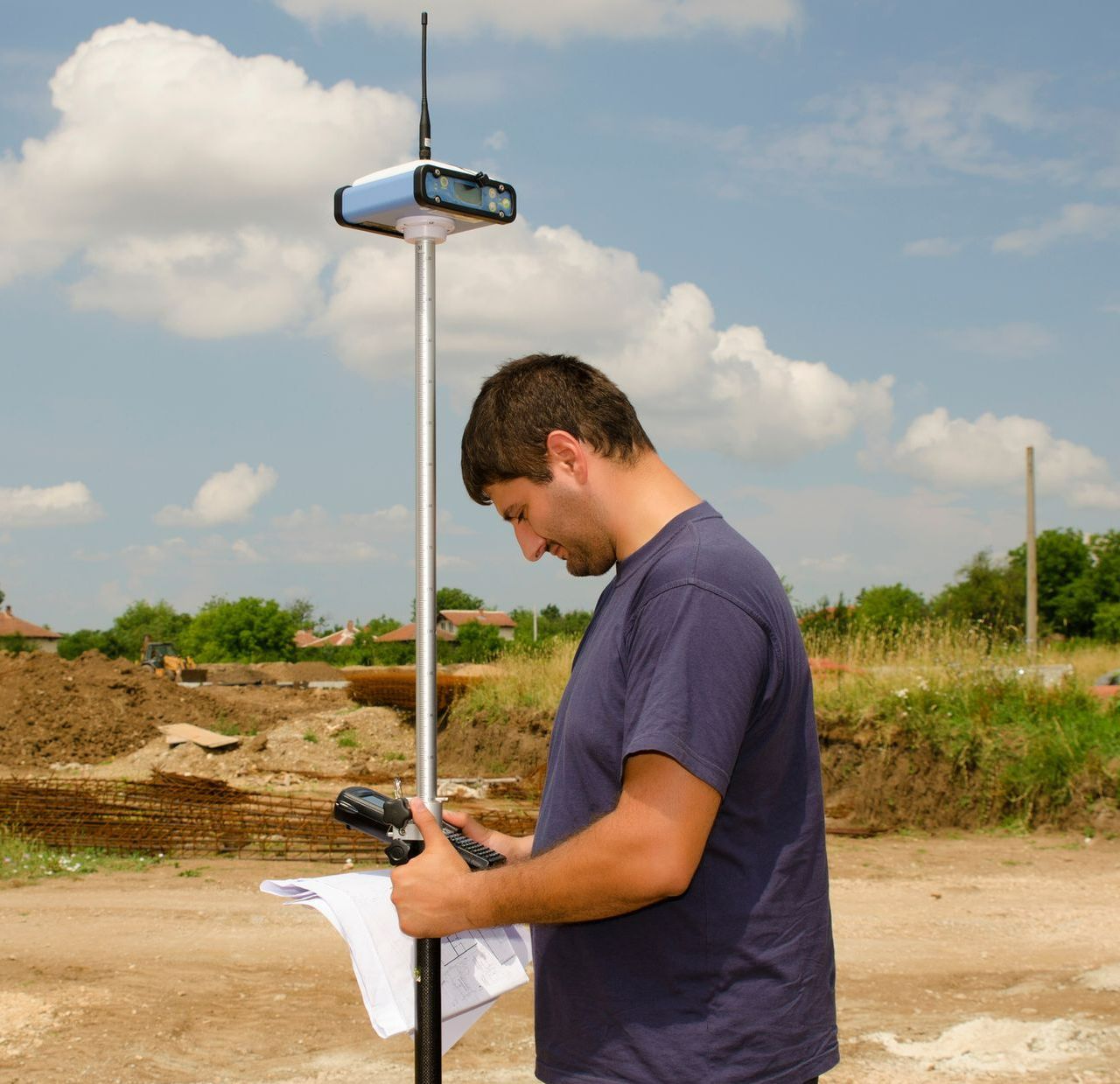 Surveyor Measuring the Field — Hutchinson, KS — Garber Surveying Service, P.A.