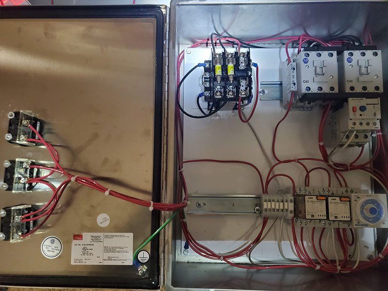 Wiring an electrical panel in St. Joseph, MO - TDR Electrical Services hard at work