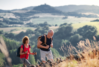 Two people on a hike to encourage weight management