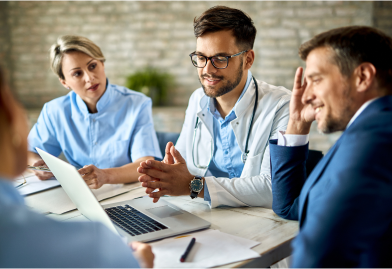 Three individuals, including a doctor, discuss digital health interventions