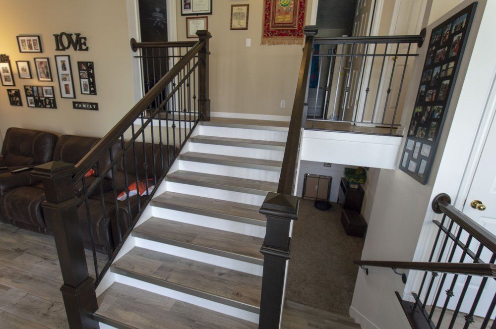 A set of stairs leading up to the second floor of a house.