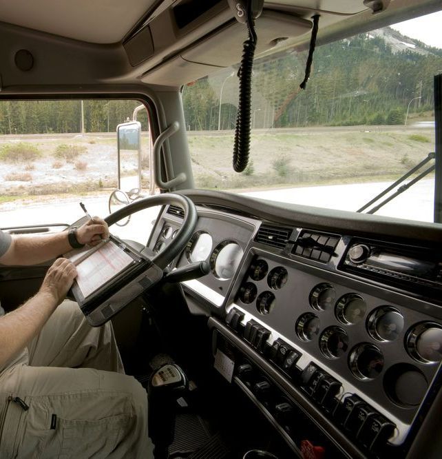 A Man is Inspecting a Car Engine — Coolangatta Automotive in Coolangatta, QLD