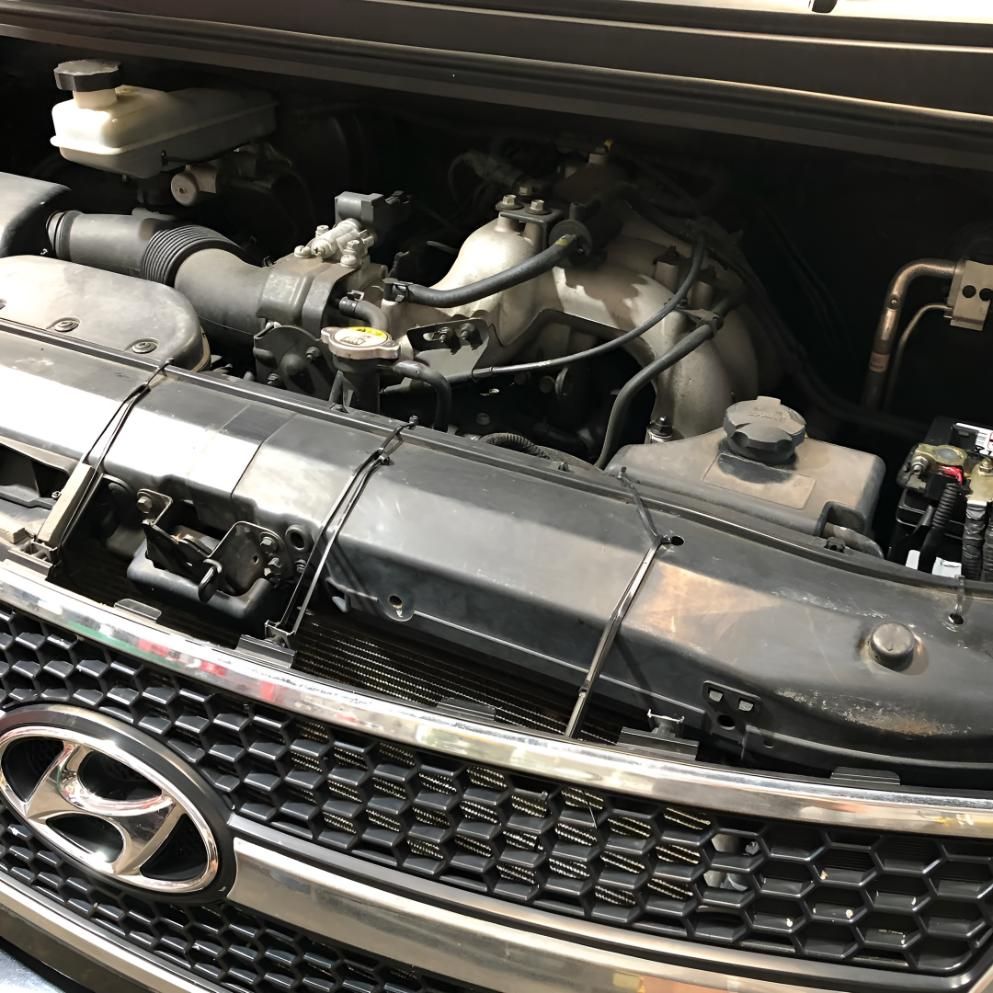 A Close Up of a Car Engine with the Hood Open — Coolangatta Automotive in Coolangatta, QLD