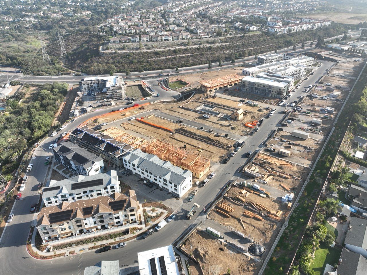 An aerial view of a building under construction in a city