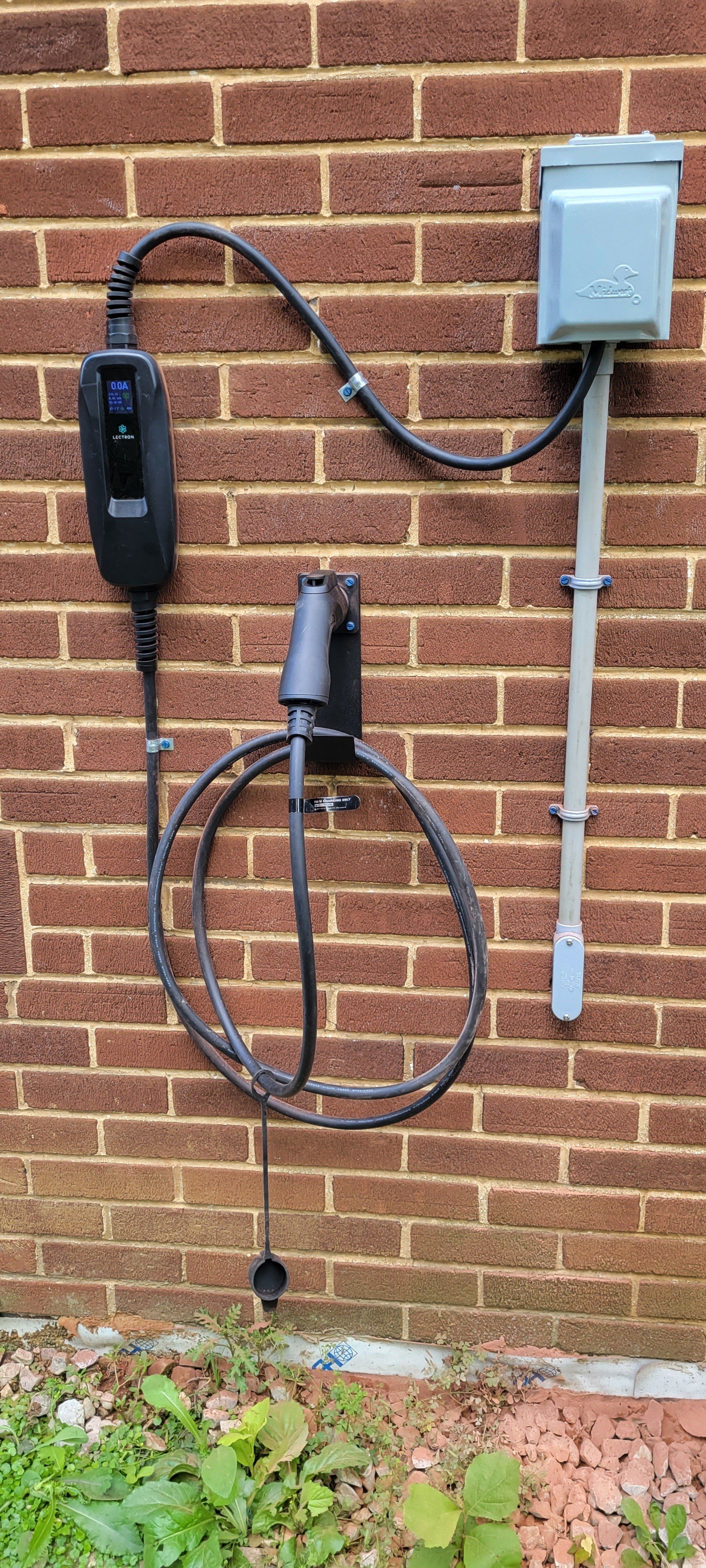 a close up of a electrical box on a wall .