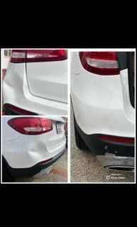 Three views of a white car’s rear bumper showing damage, including a large dent and scraped black plastic trim.
