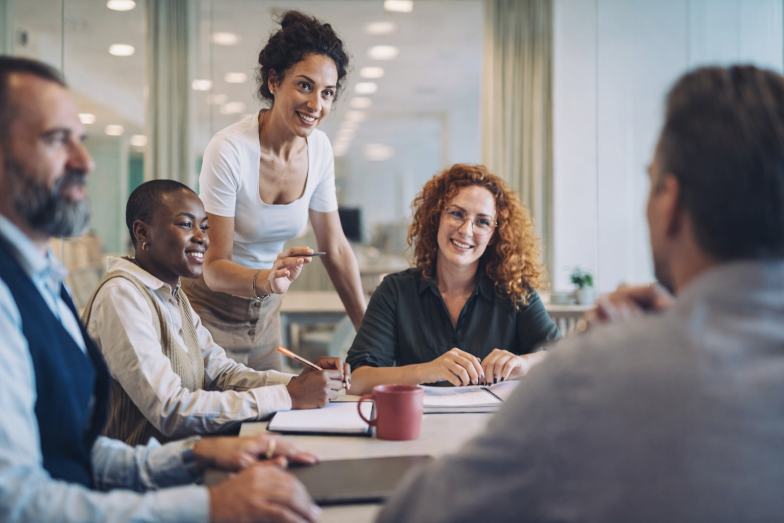 Business team using MyManager all-in-one platform to manage workflows, scheduling, CRM, and communic