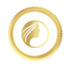 A gold seal with a woman 's face in the center