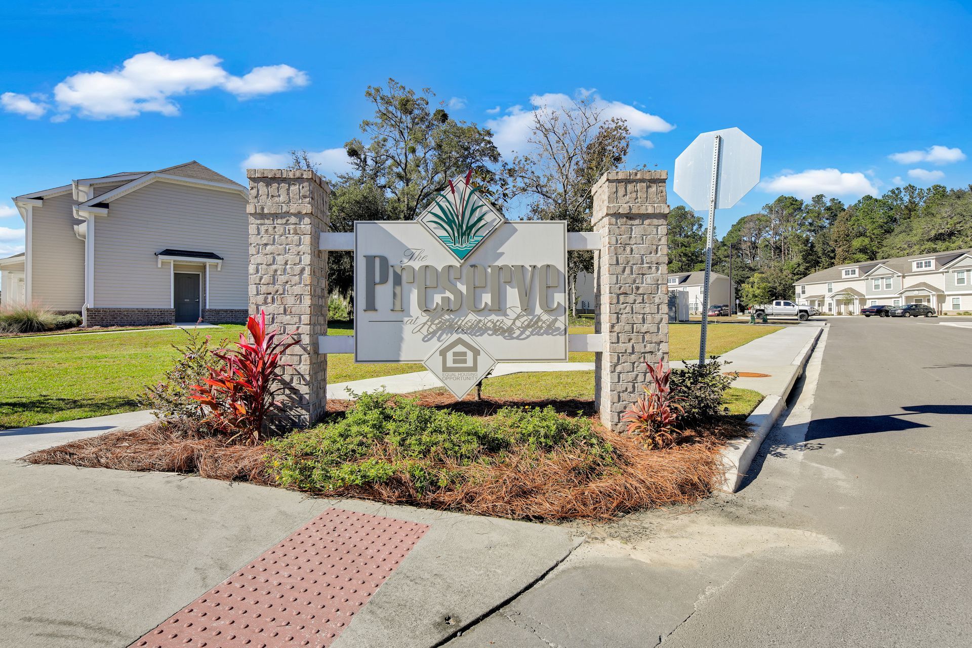 A sign that says prestige is on the side of the road