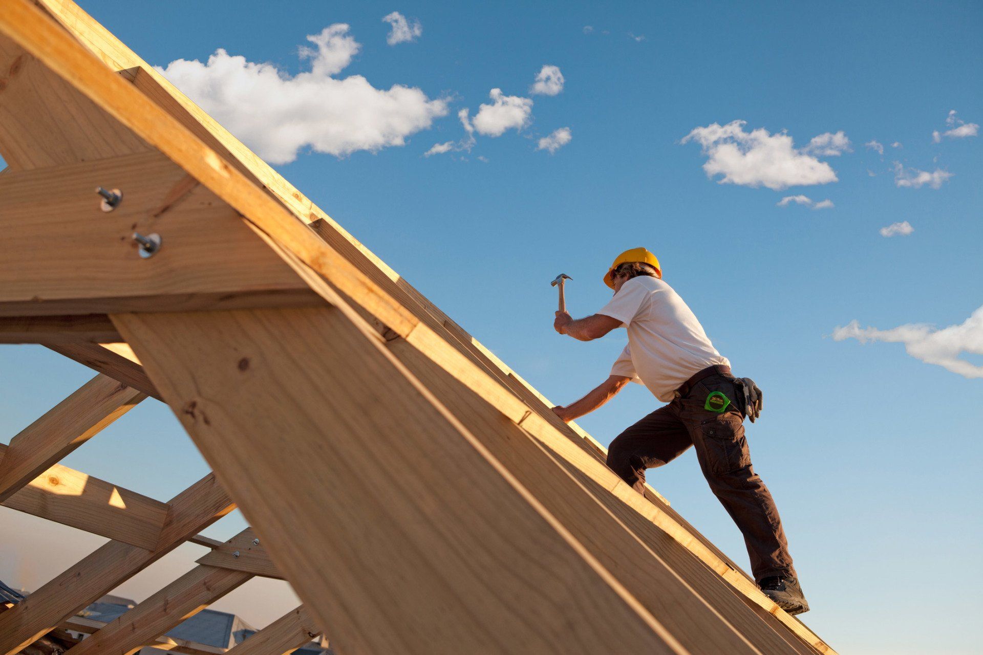 Indoor Painting — Carpenter Working on Roof  in Gray, GA