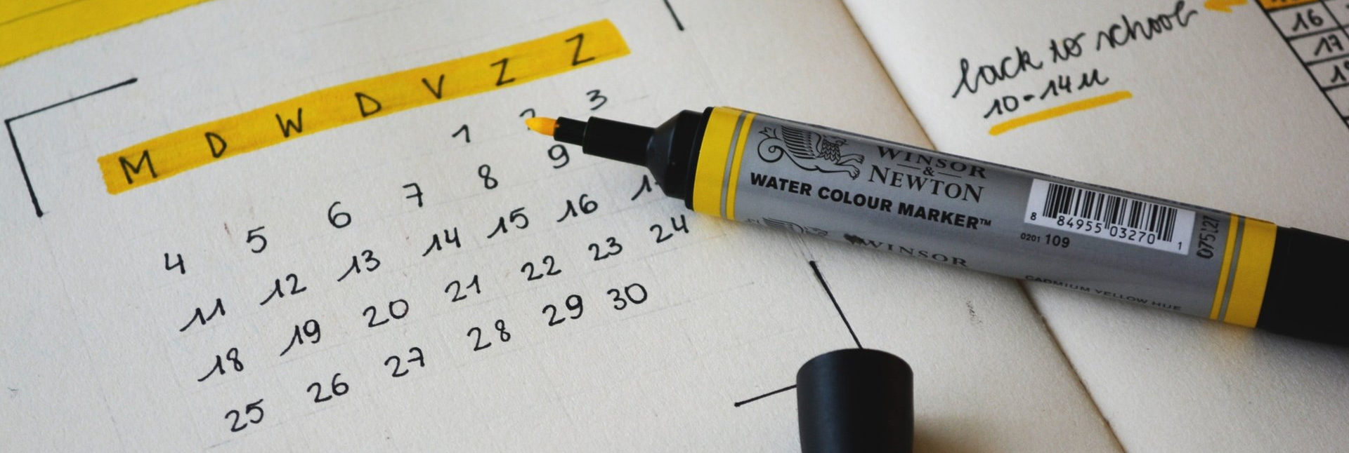 Calendar with marker booking a date for an overlay installation.
