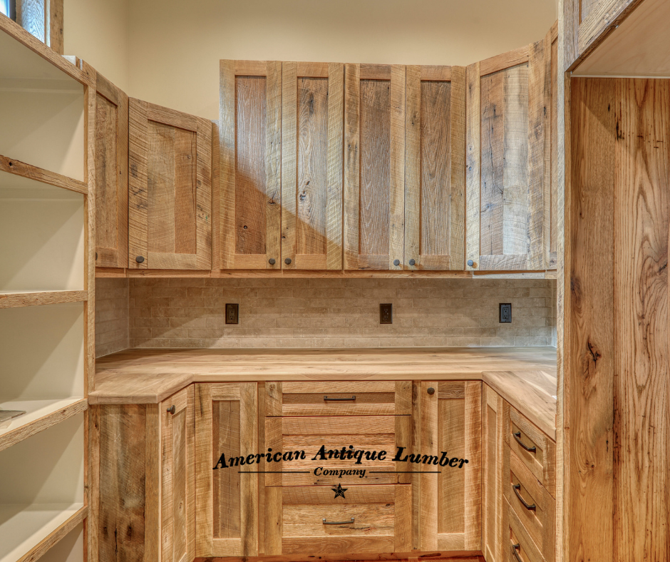 Reclaimed wood cabinets and drawer in a walk in pantry.