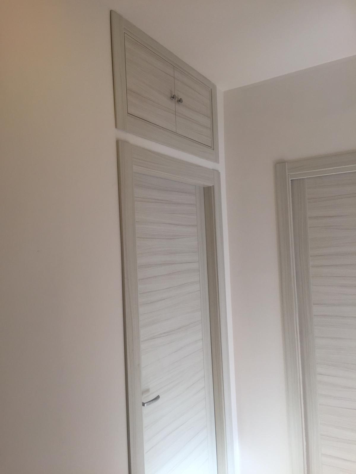 porta laminato palissandro bianco con sportello a parete