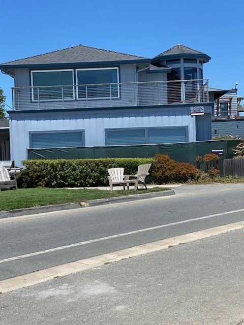 House With Resting Chairs Outside — Santa Cruz, CA — Better Roofing With Travis