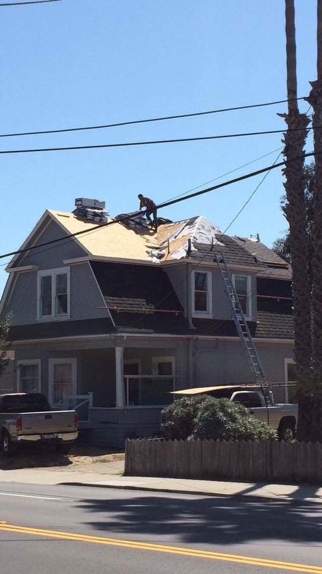 Man Repairing Roof — Santa Cruz, CA — Better Roofing With Travis