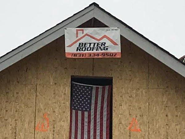 Commercial House Roof With Company Logo — Santa Cruz, CA — Better Roofing With Travis