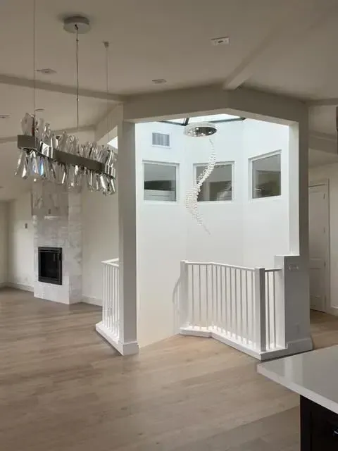 There is a staircase in the middle of the room.