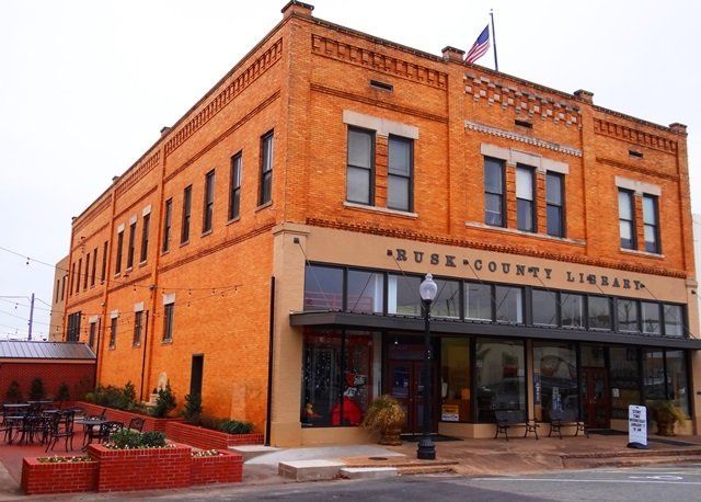 A large brick building with the word library on it