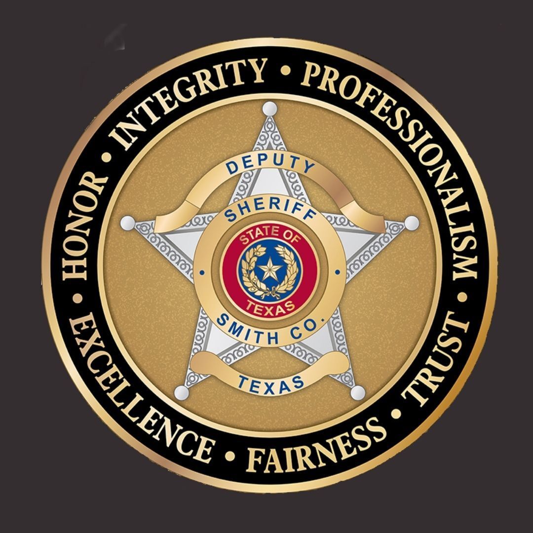A badge that says integrity professionalism honor excellence fairness trust