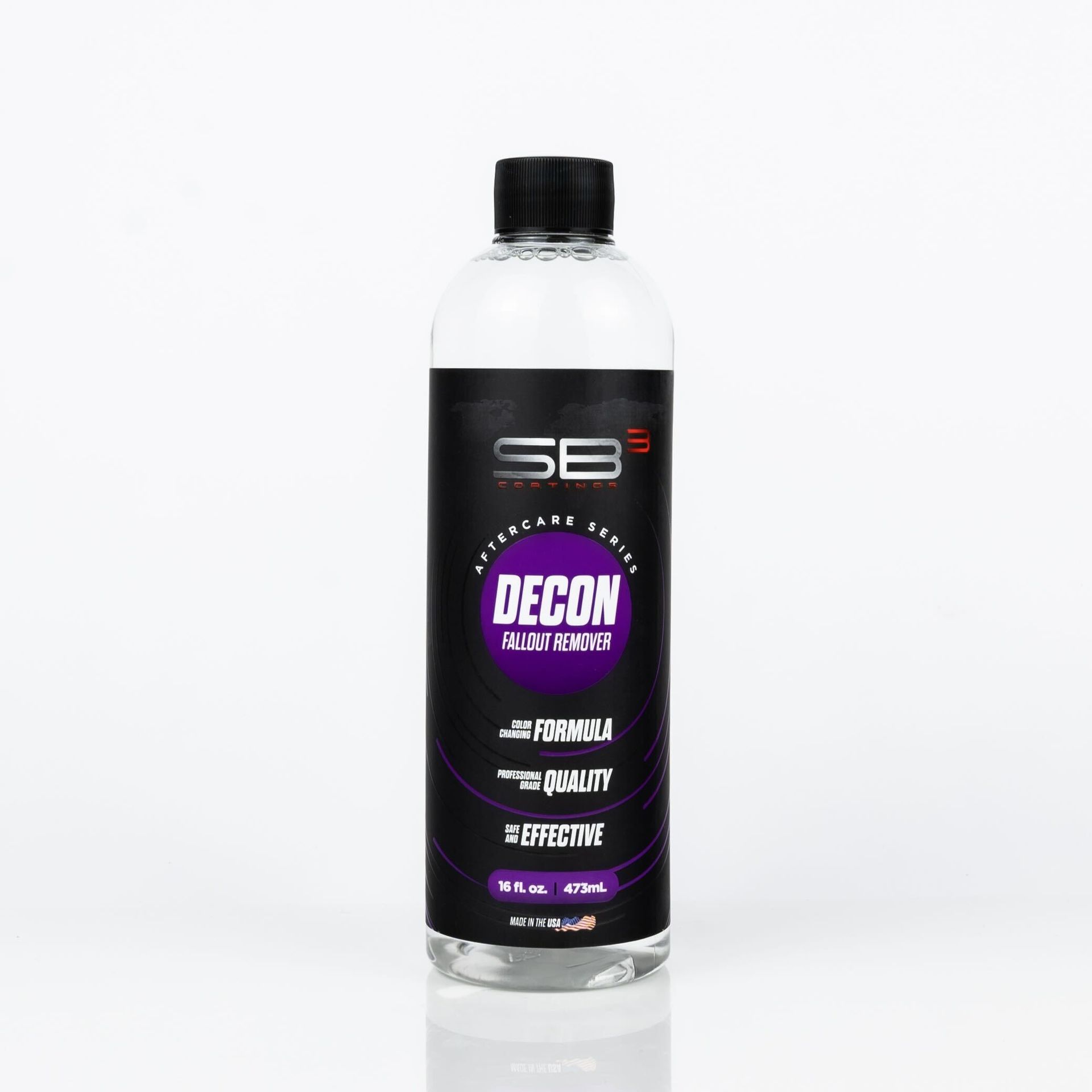 A bottle of decon is sitting on a white surface.