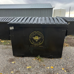 Black dumpster with