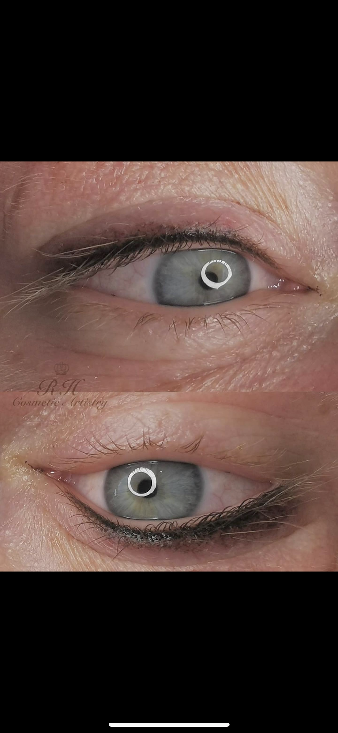 A close up of a woman 's eye with makeup on it.