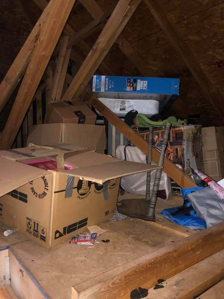 There are a lot of boxes in the attic.