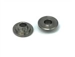 A Pair Of Metal Washers With A Hole In The Middle On A White Surface — Warren, MI — Howard's Outdoor Power Equipment
