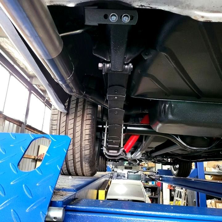 A Red Car With The Hood Up And The Engine Visible - Mechanic In Fyshwick, ACT