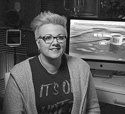 Christina Riley headshot in recording studio, (studiobeanhead owner)