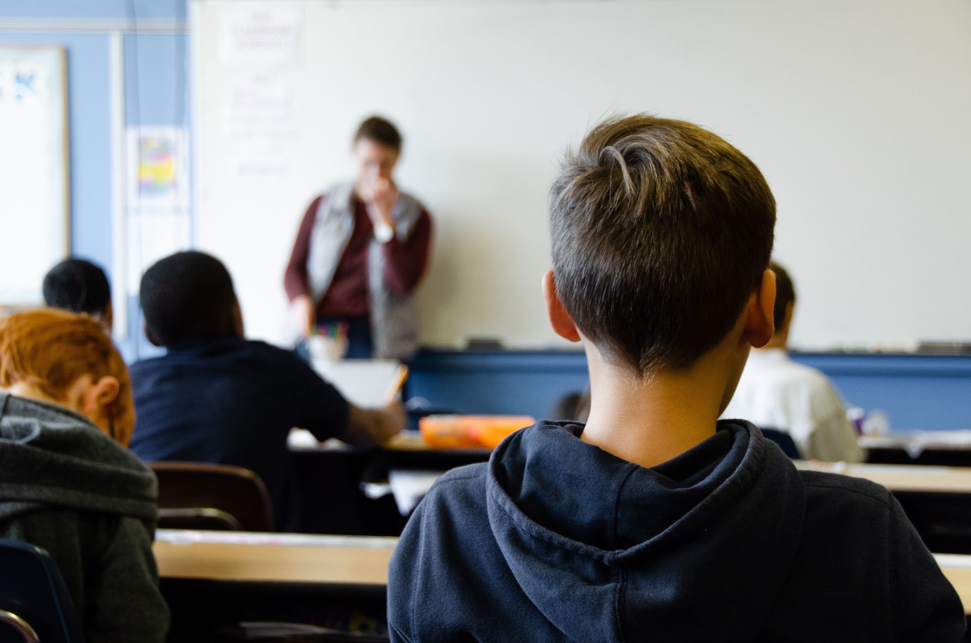 Students and teacher using SpotCheck in Utah